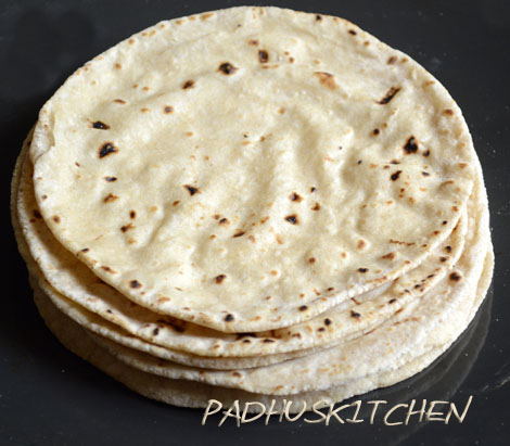 Image of Phulka Chapati (Roti) On Non Stick Tawa.Indian